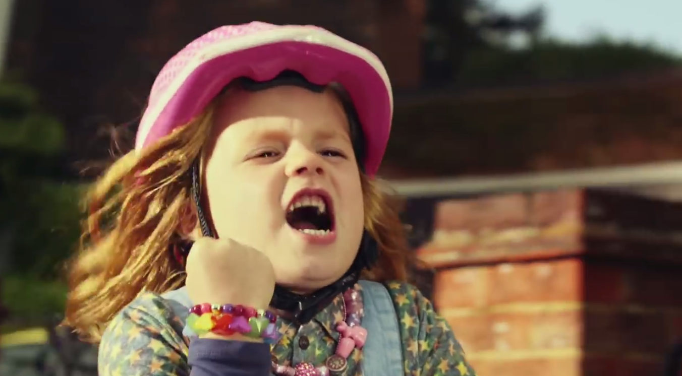 Watch This Girl And Cat Jam Out To Starship’s “We Built This City” While On Her Bicycle (On Training Wheels)