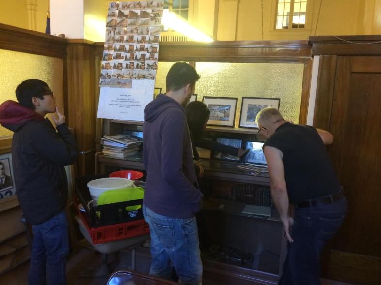 Michael, Rob, Heidi and Tim searching for the man Heidi saw in the library.