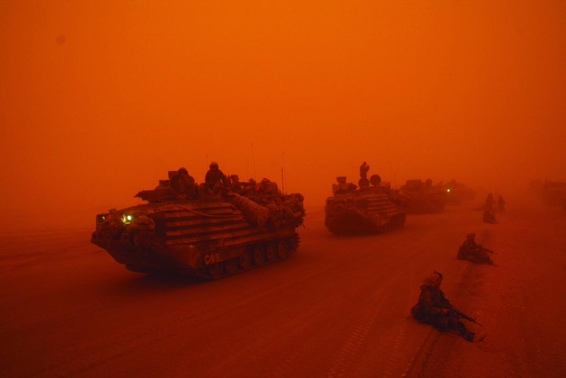 FILE -- A severe sandstorm blanketed a convoy from the Headquarters Battalion of the 1st Marine Division north of the Euphrates River in Iraq, on March 25, 2003. President Barack Obama announced Oct. 21, 2011, that the United States had fulfilled its commitment in Iraq and would bring all U.S. troops home by the end of the year. (Ozier Muhammad/The New York Times) EDS NOTE: PHOTO HAS ORANGE OVERCAST BECAUSE OF SAND STORM - DO NOT COLOR-CORRECT