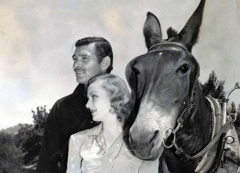 Clark Gable, Carole Lombard, and friend. (Wikimedia Commons) 