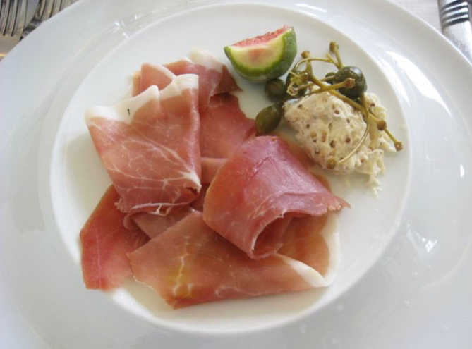 Prosciutto, fig, and mustard for breakfast in Barcelona