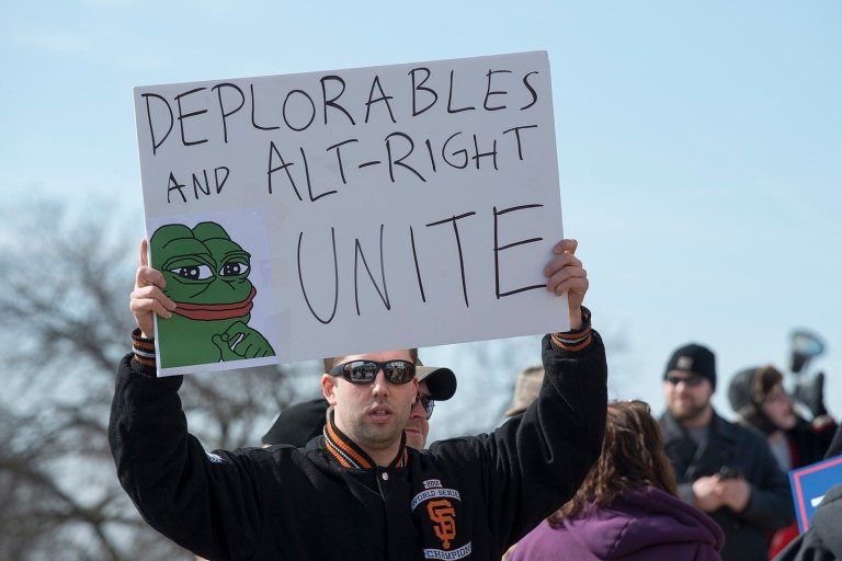 AltRight Dude Holds Up A Sign Loving Being AltRight