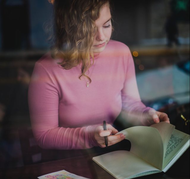 Woman at a writing retreat