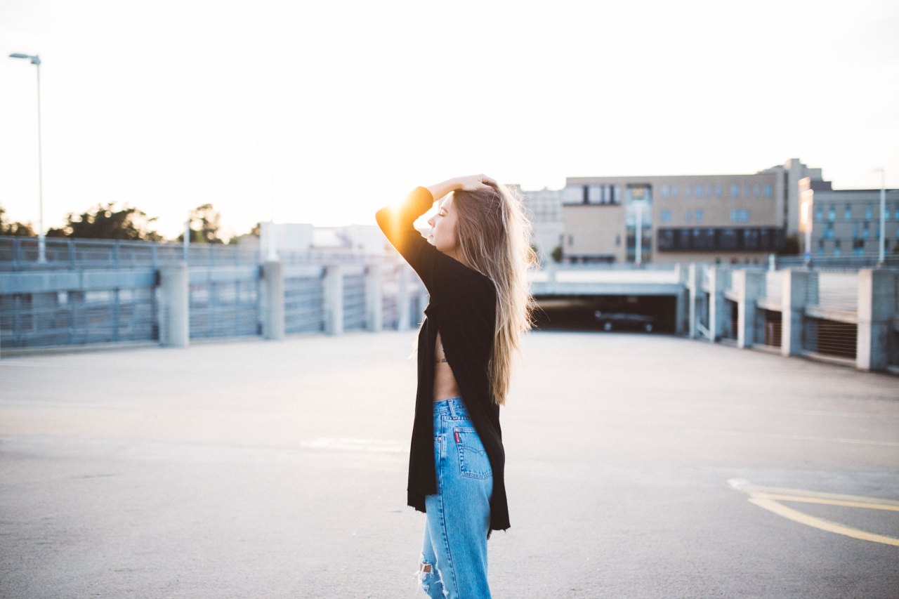 girl brushing fingers through hair