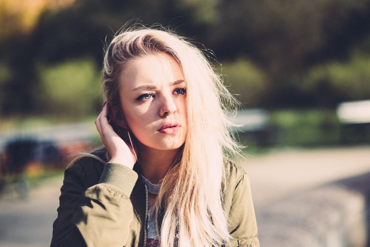 Blonde woman staring into distance