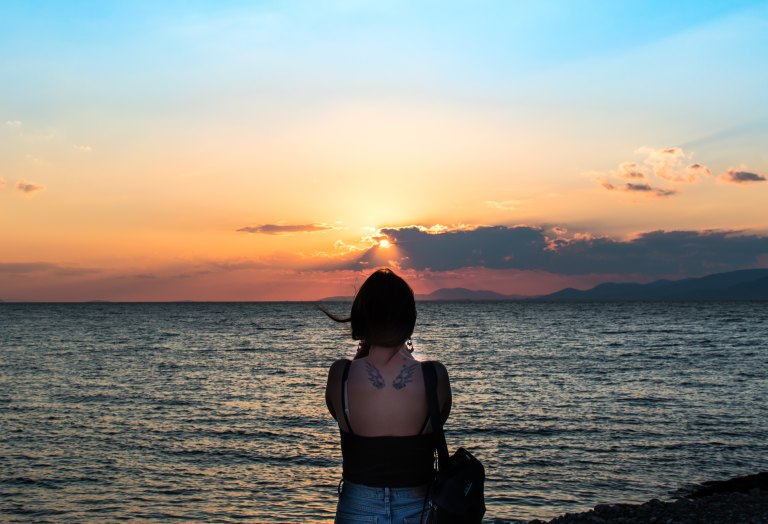 Girl Watching Sunset