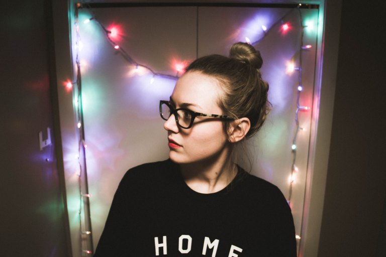 girl with glasses and lights