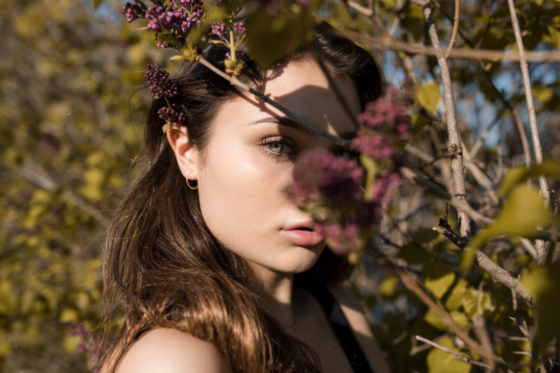 girl with blue eyes hiding