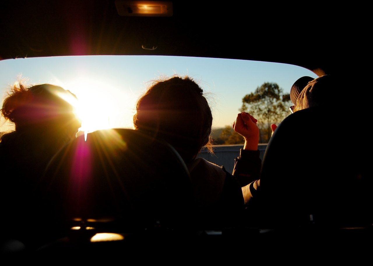 people sitting in car