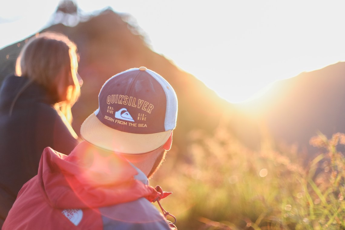 couple sitting at sunset