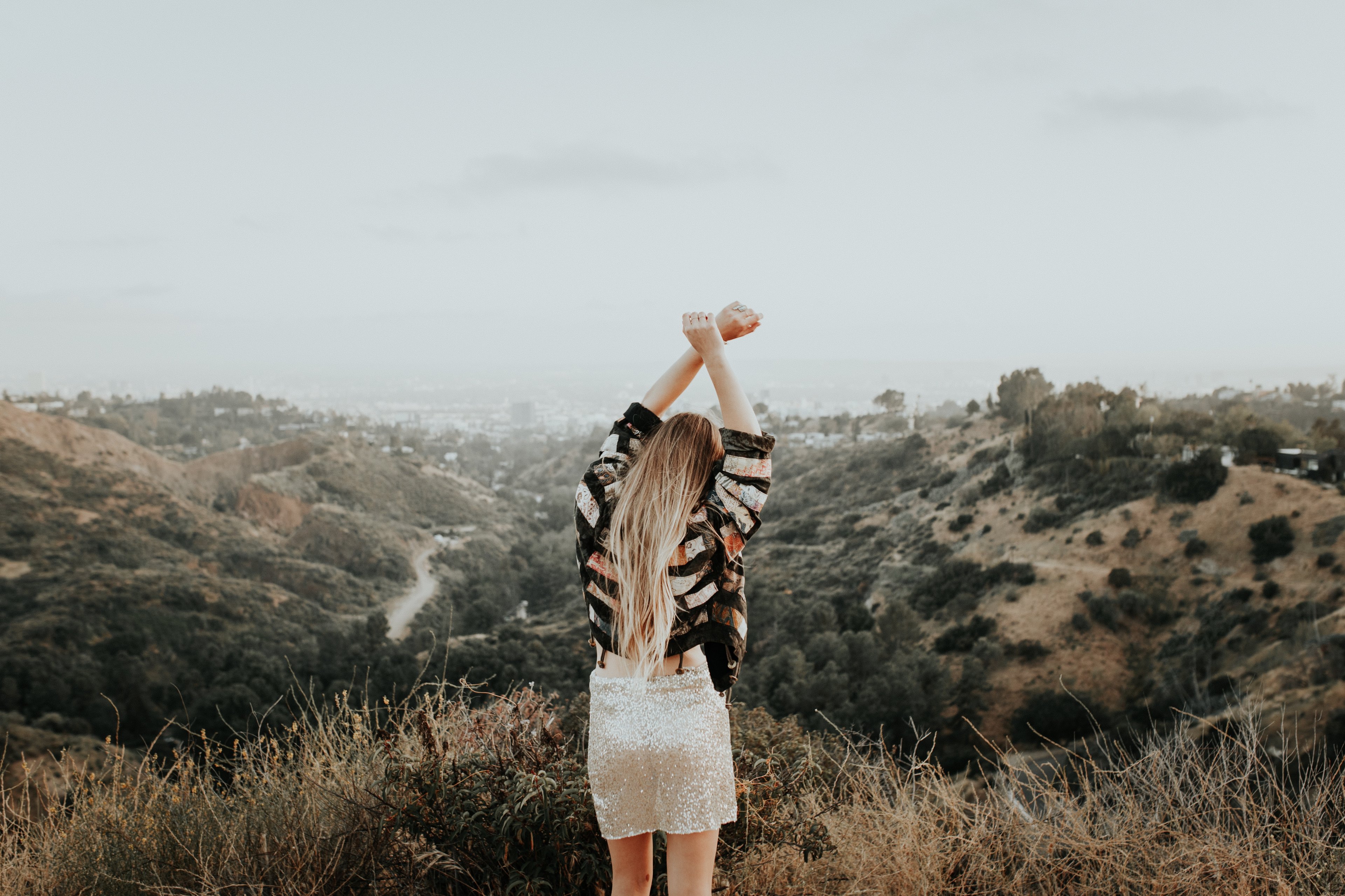 girl with arms in the air, girl letting go, quotes about love and letting go, learning to let go