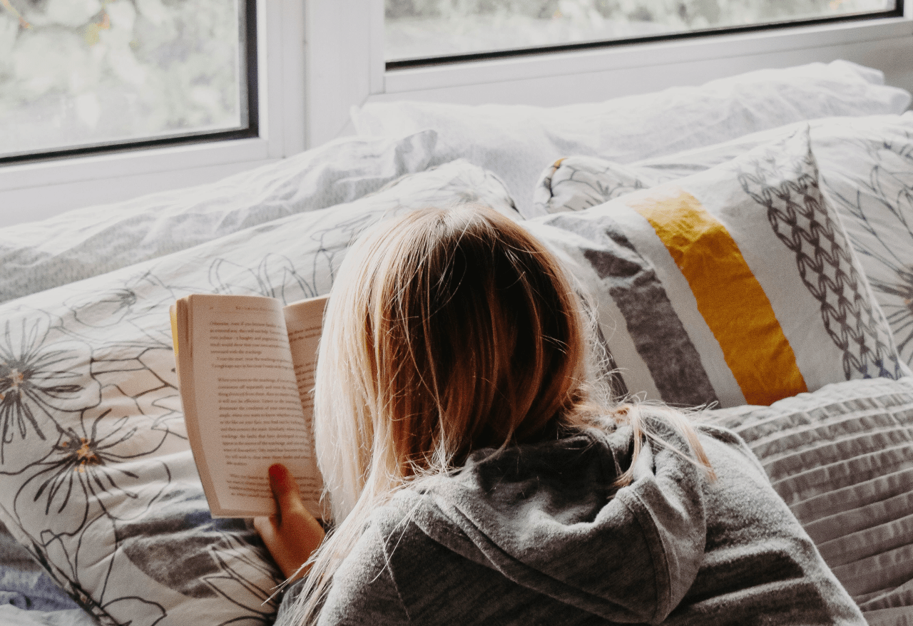 girl reading her favorite books