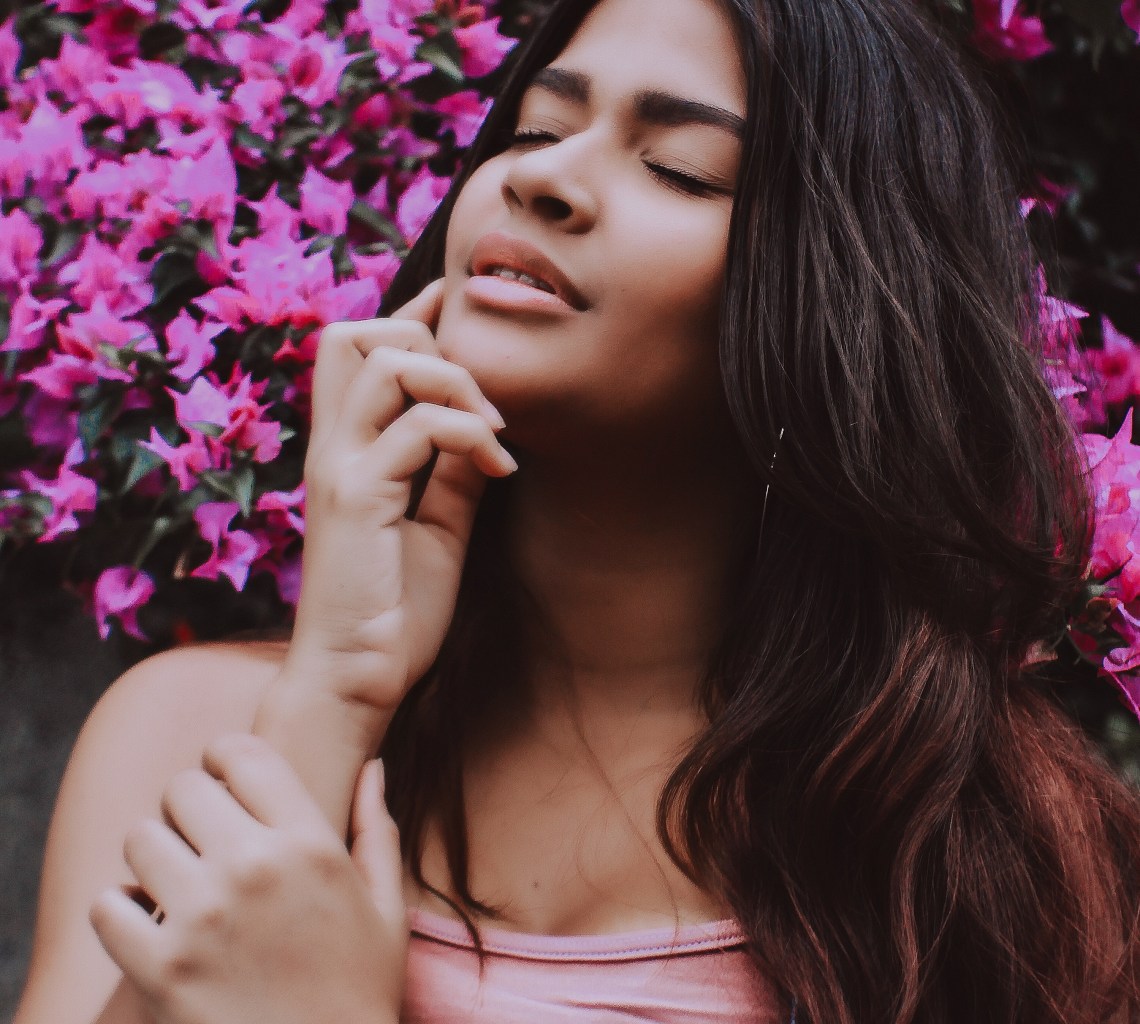 girl in flowers, girl looking up, bittersweet reality of pain, truth about pain