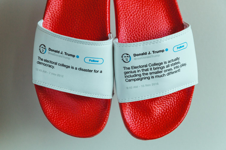 A pair of flip flops with Donald Trump tweets on them