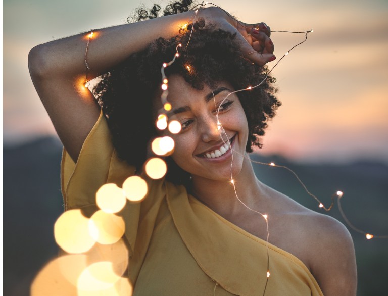 girl playing in lights, happy girl, creative soul