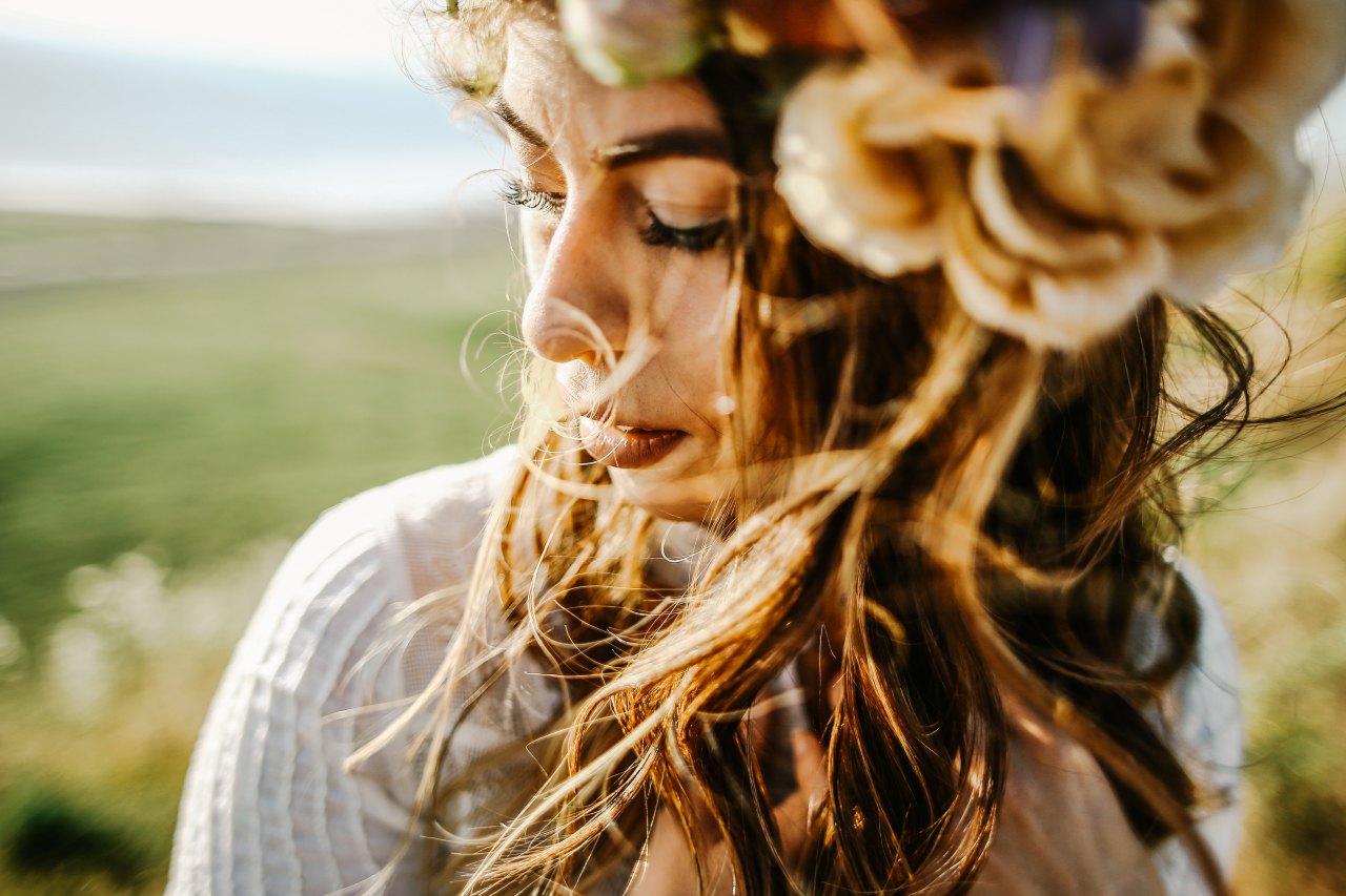 woman with hair blowing in wind