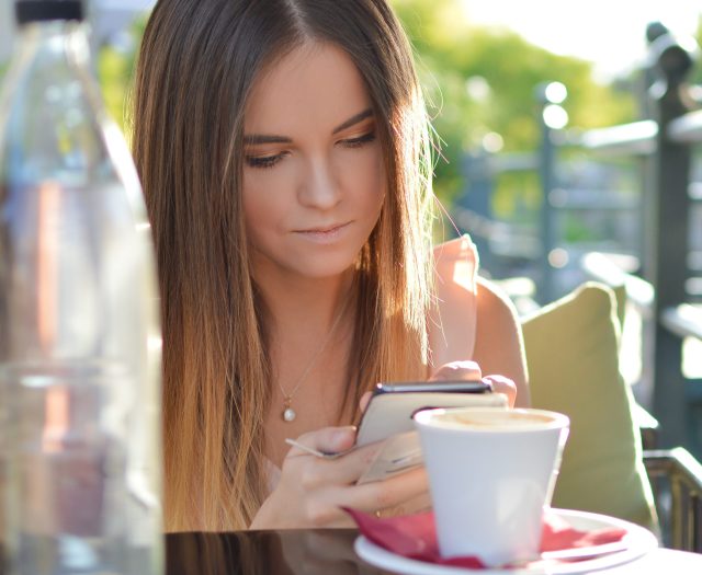 Girl reading her texts