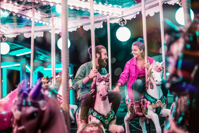 couple on merry go round, happy couple, defining love, real love, forever love, happy couple