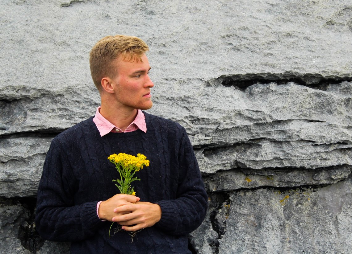 A boy with flowers