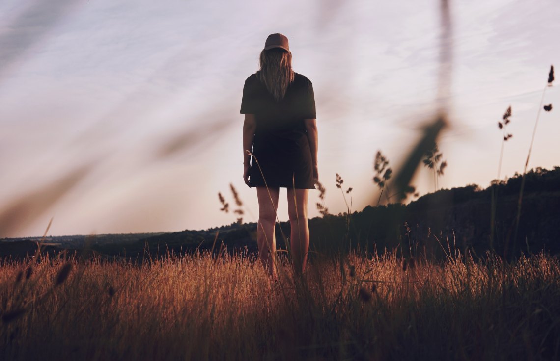 Woman standing in field