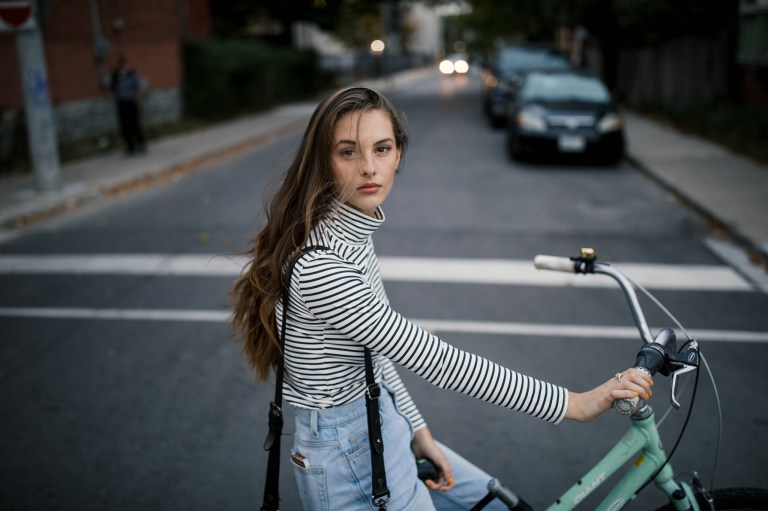 enticing woman on bicycle