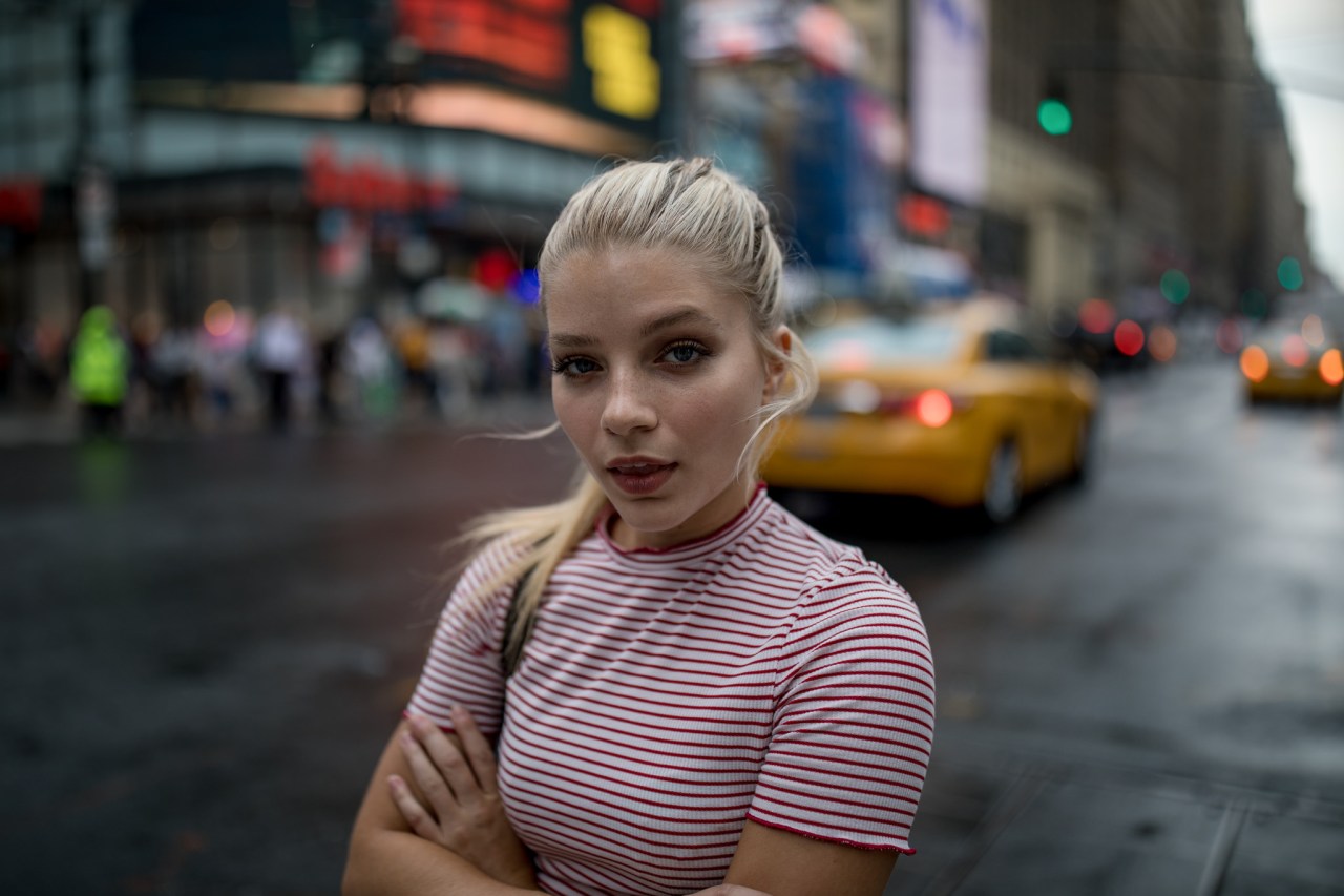 blonde girl crossing arms