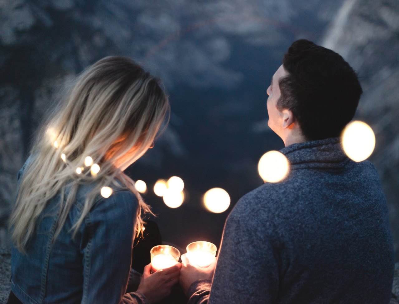 Couple surrounded by lights