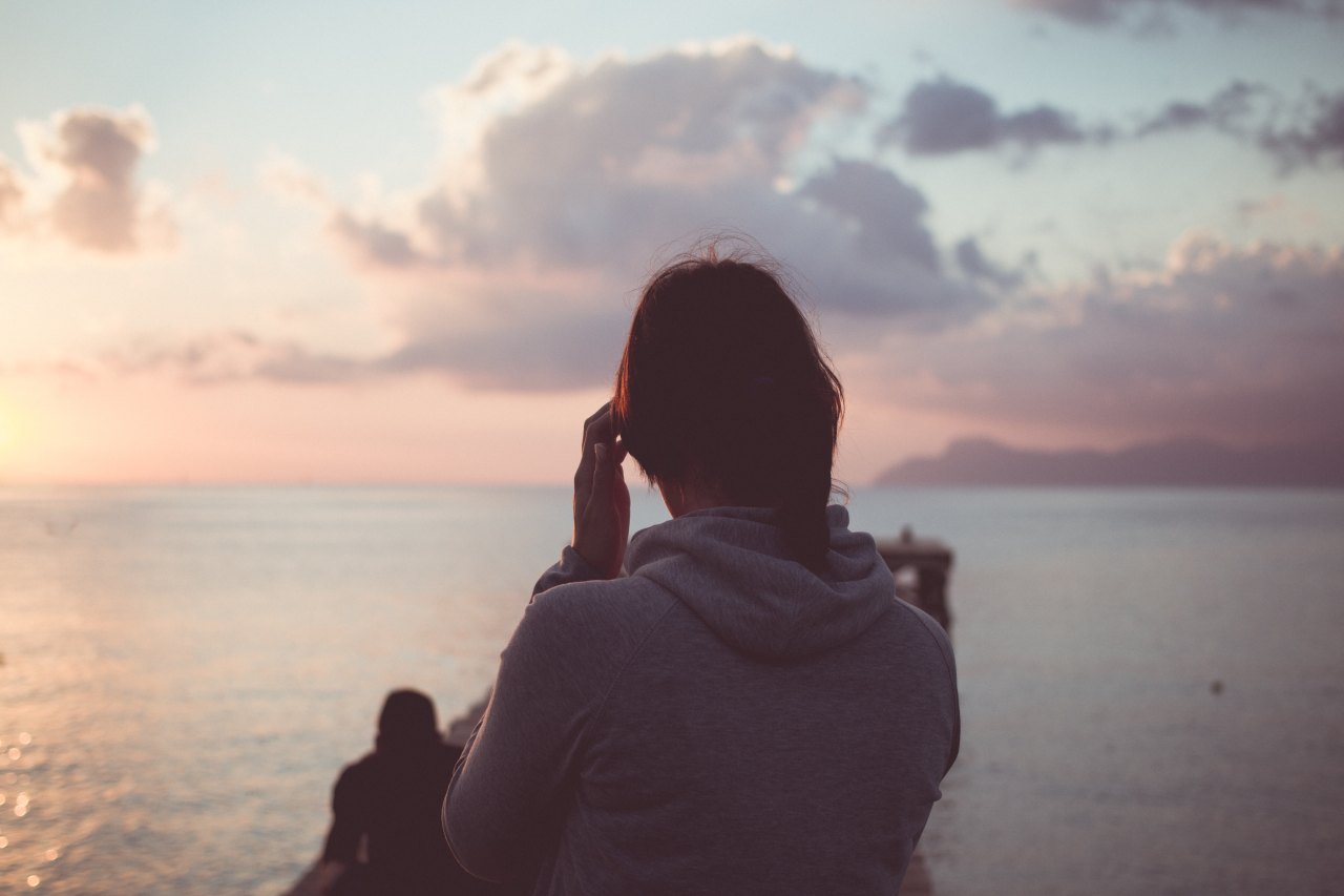 Girl staring at ocean