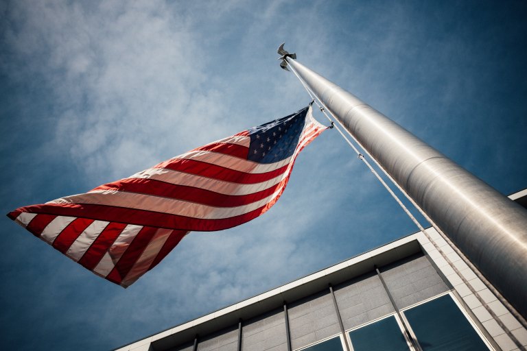 The American Flag flying in the wind