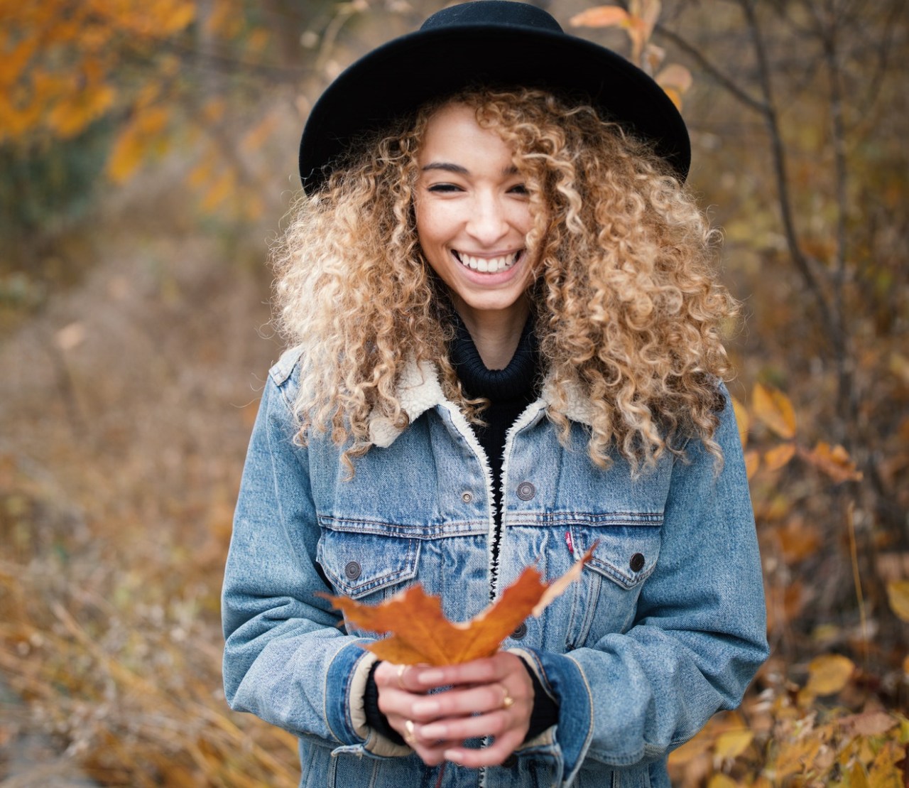 happy woman with leaf, Christian faith, being a good Christian, being a faithful Christian, loving like Jesus