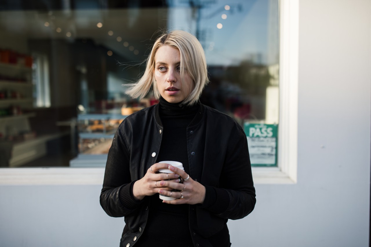 blonde girl with coffee cup