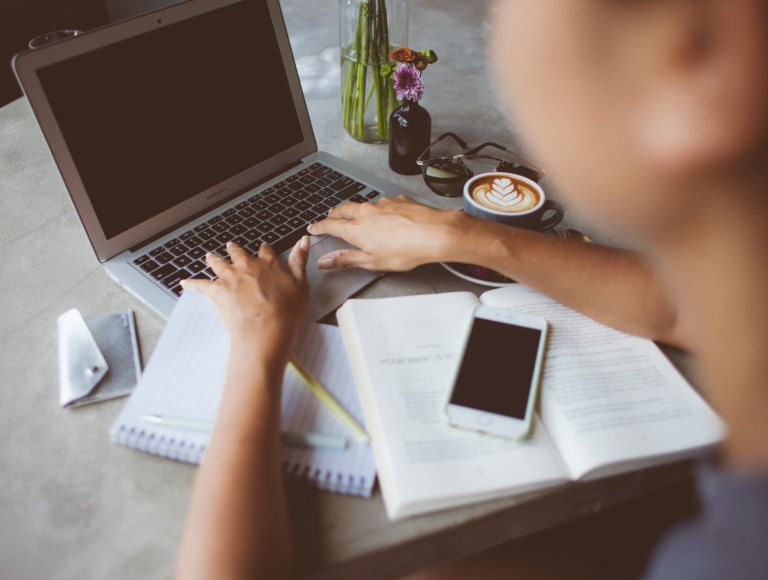 person writing, writer, person on laptop, self-publishing