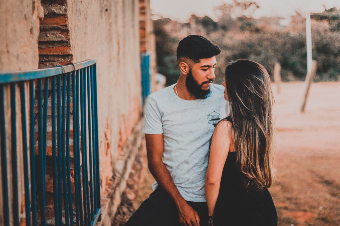 Guy and girl embracing