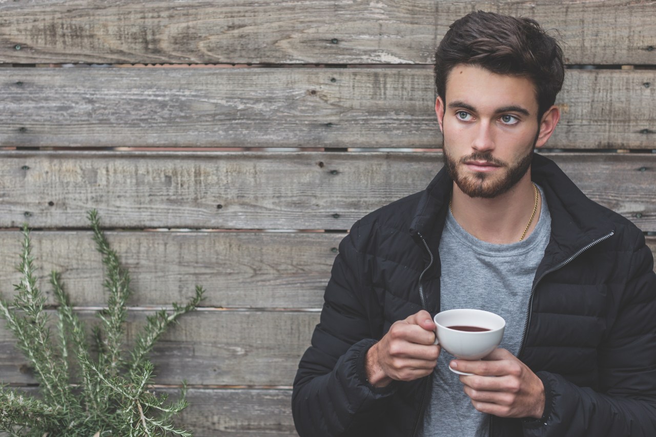 man drinking coffee