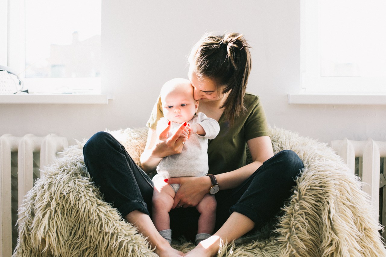 new mom holding baby