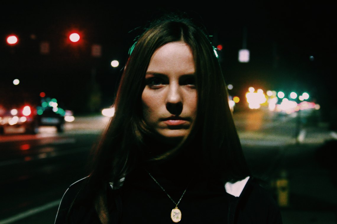 girl in street staring at camera, strong woman, being brave, be brave