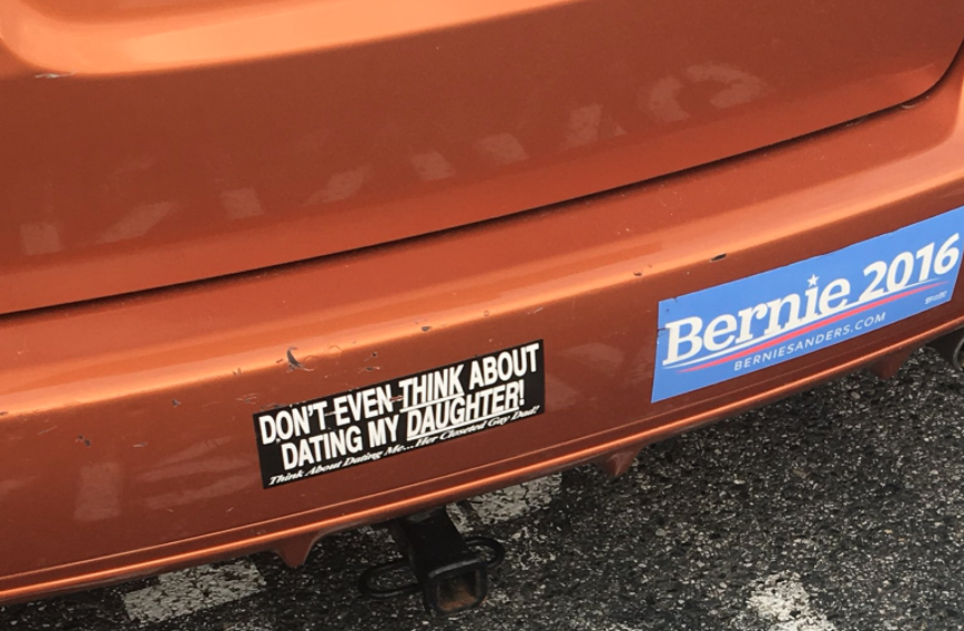 A sexist bumper sticker on a dad's car