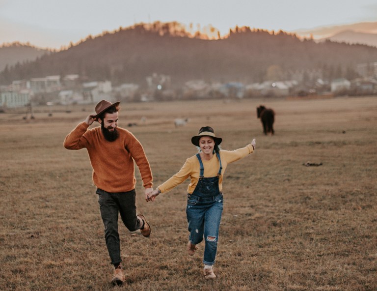 happy couple running, running couple, almost love