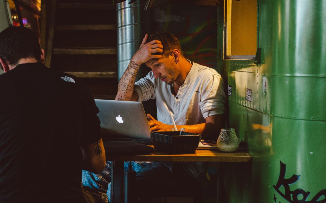 man typing on computer, being a writer, reasons to write