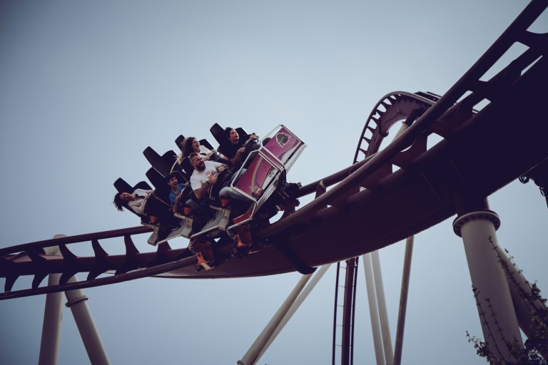 people on a roller coaster