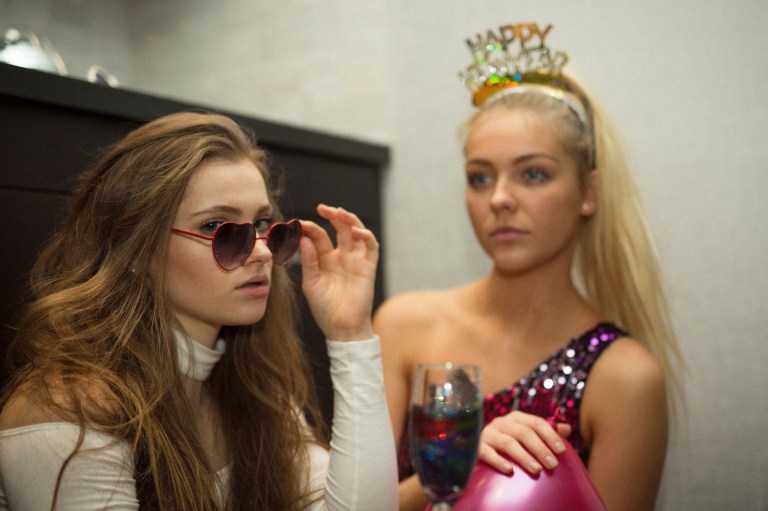 two moody girls in new year celebration