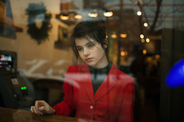 woman deep in thought at cafe