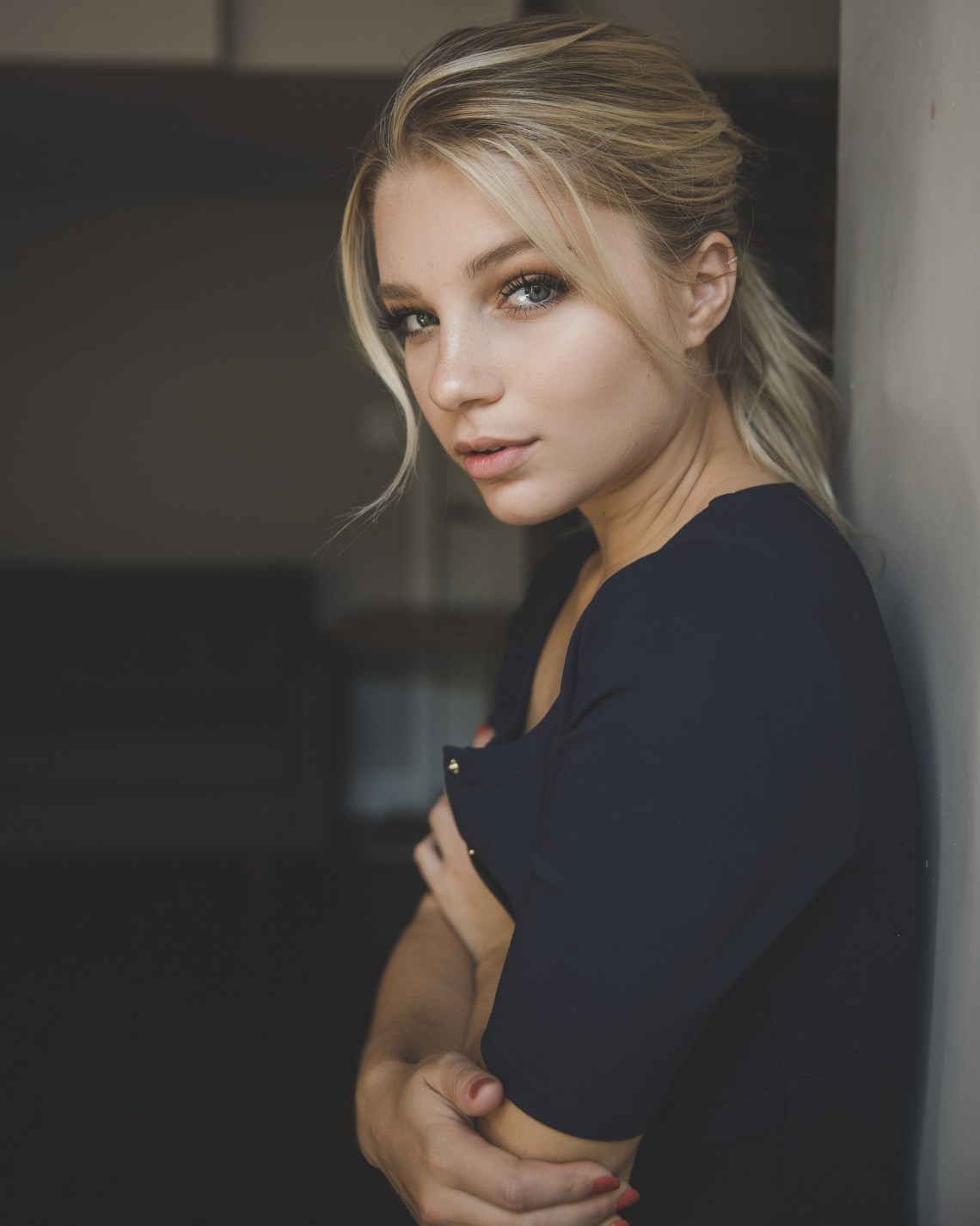 blonde woman in a black dress