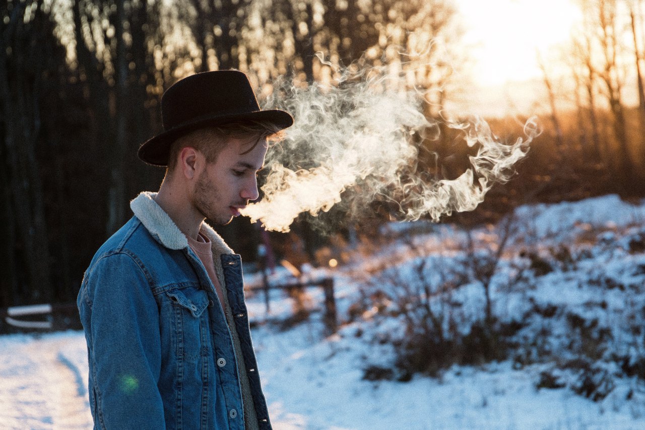 man breathing in the cold hair