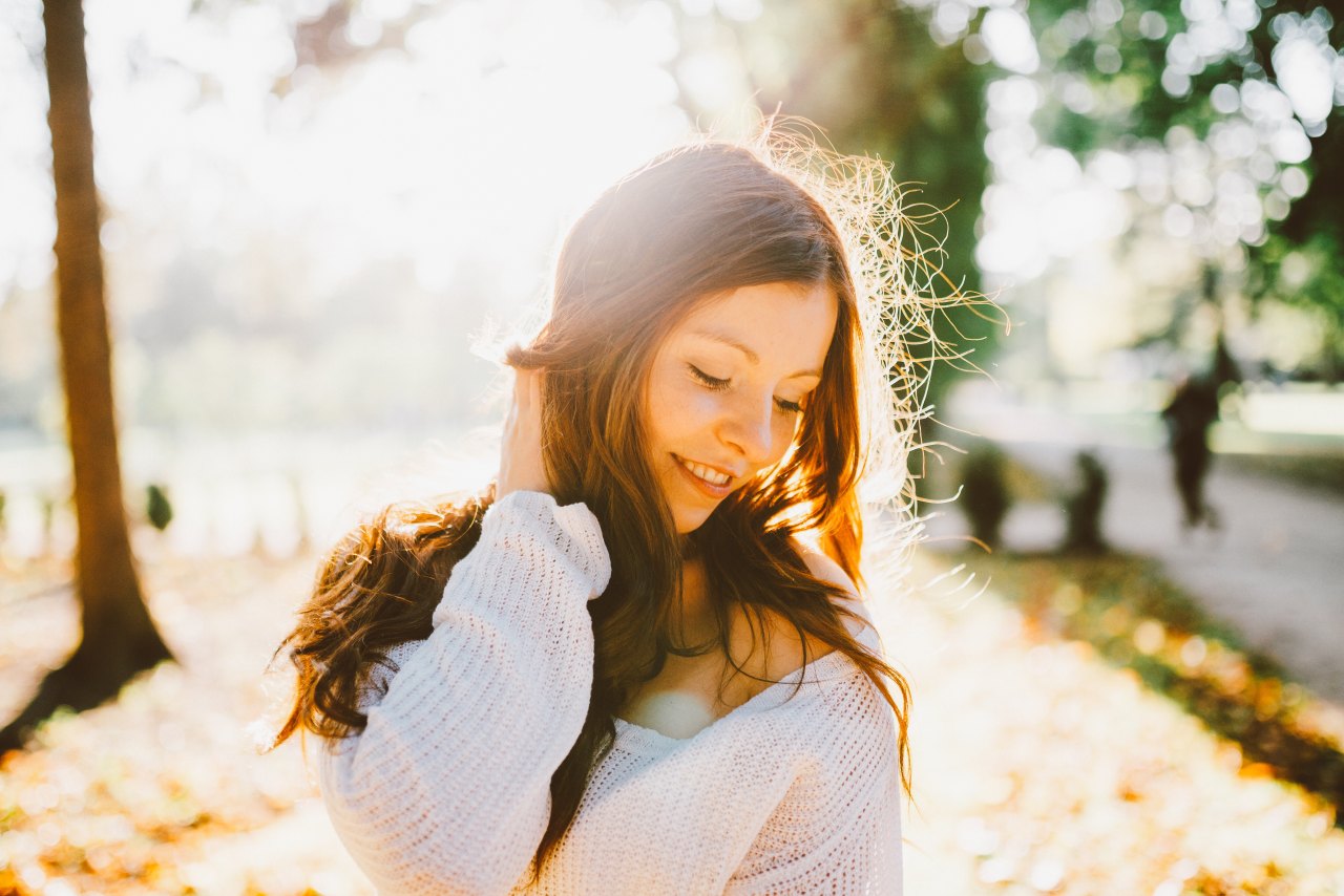 girl standing in the sunlight