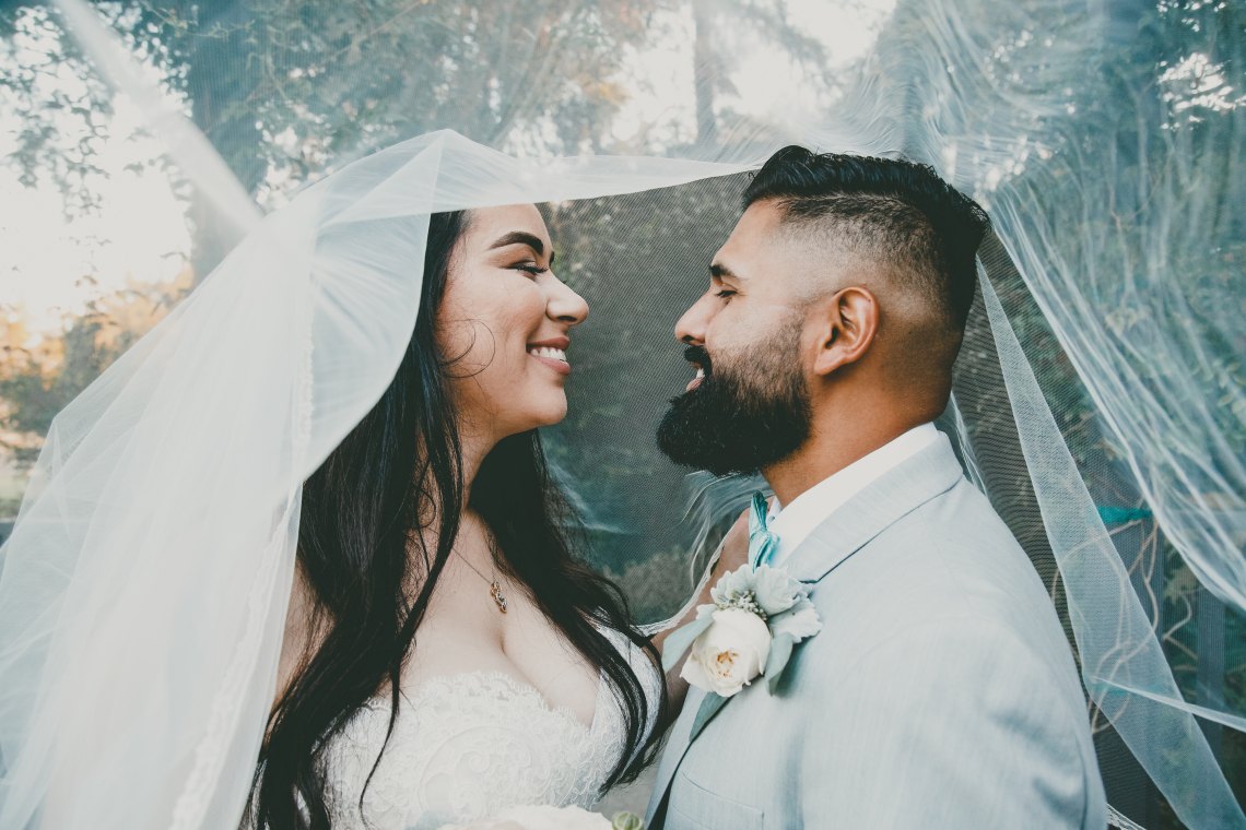 bride and groom looking lovingly at each other