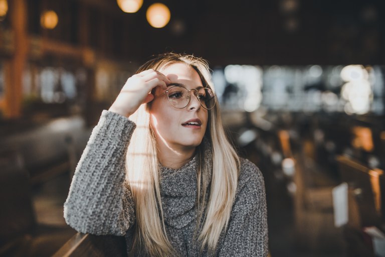 blonde woman with glasses