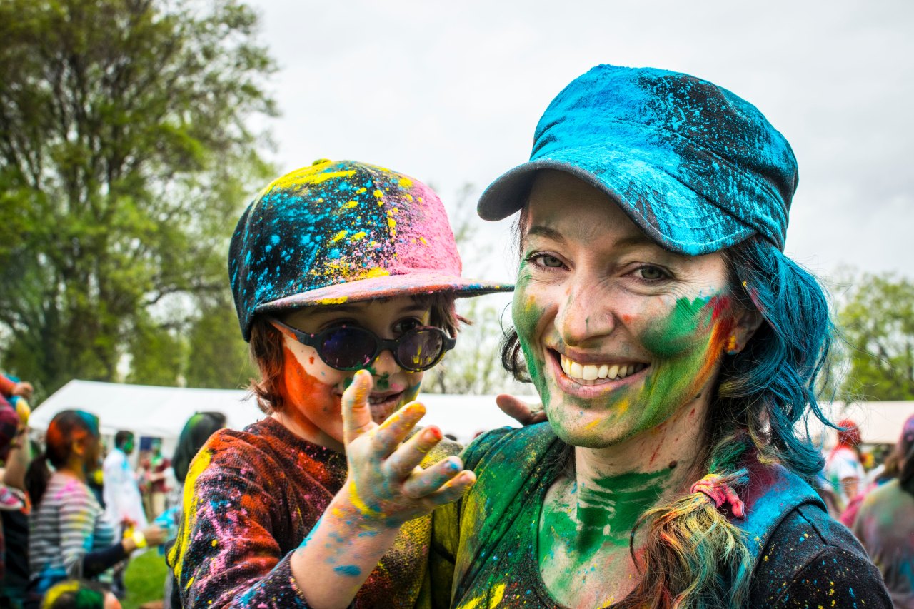 mother and child covered in paint