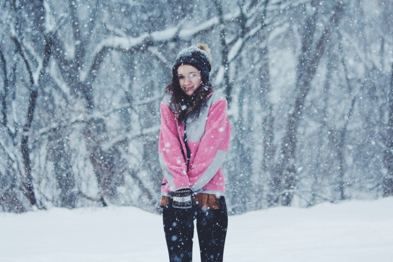 woman standing in snow