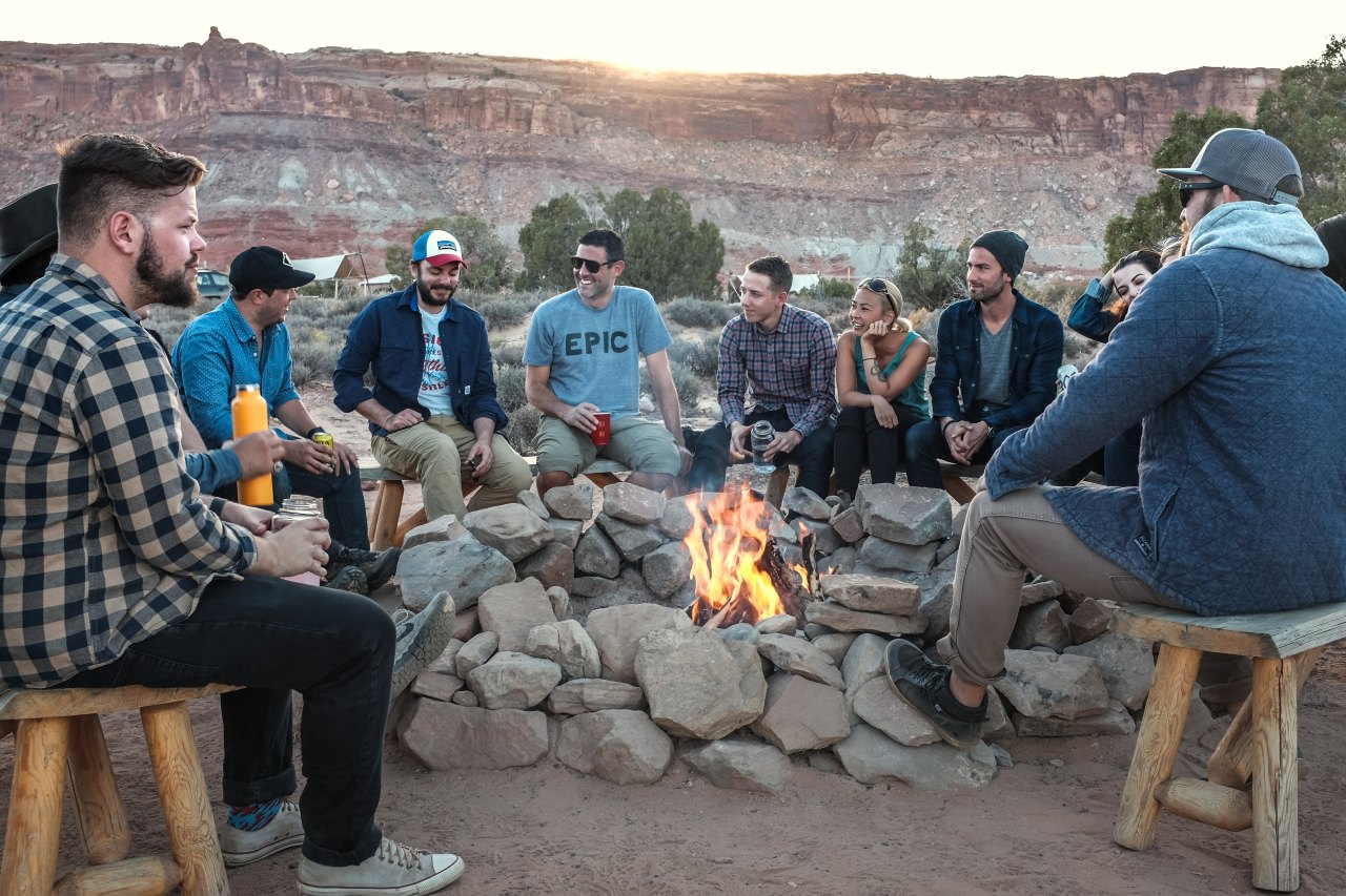 friends around bonfire